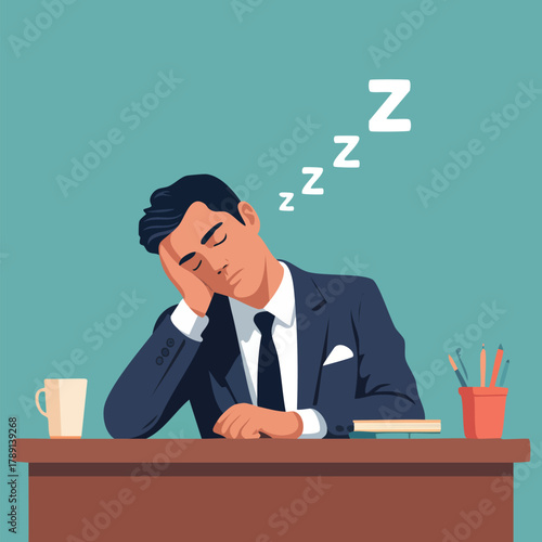 Sleeping businessman at work with his head on desk and coffee break time