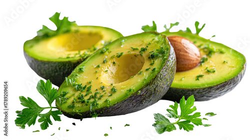 Fresh sliced avocado halves seasoned with chopped herbs and garnished with green parsley leaves for healthy cooking isolated on white background