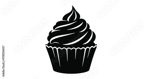 Decadent black cupcake with swirling white frosting isolated on white