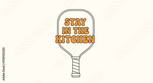 Pickleball paddle outline with orange text 'STAY IN THE KITCHEN' on a light background, representing a popular pickleball phrase.