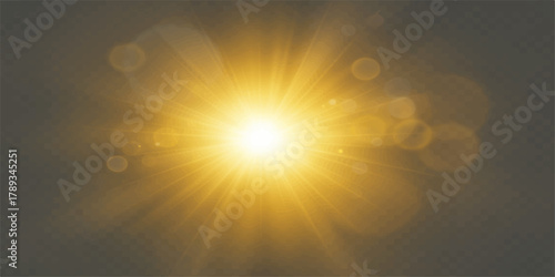 Bright summer sun rays burst across a blue sky with an abstract light background