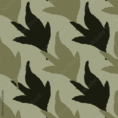 Green camouflage pattern with leaf shapes nature inspired army design for outdoor gear