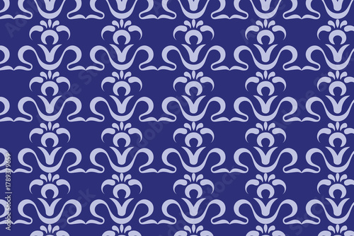Elegant damask pattern with golden floral ornaments on a dark blue background, creating a vintage and luxurious feel