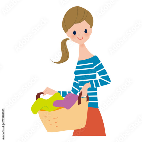 洗濯カゴを持っている女性の上半身
