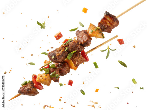 Delicious barbecue grilled pork meat skewer and fresh food kebab with pineapple. An appetizing and tasty appetizer isolated on background