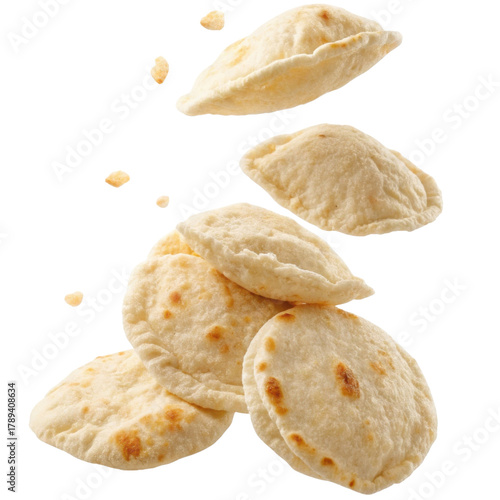 Savory mini pita bread snack falling in stack. delicious baked food appetizer perfect for eating, isolated on transparent background