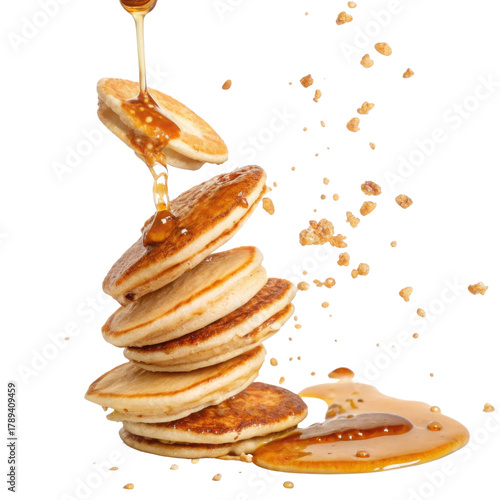 Delicious stack of falling pancakes with pouring syrup. Sweet breakfast food dessert, appetizing and tempting on clean background
