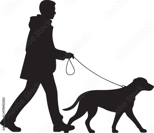 Young man taking his golden retriever for a walk on a leash, enjoying outdoor leisure and pet companionship