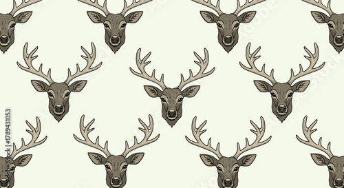 Seamless pattern of majestic deer heads with impressive antlers on a light background.