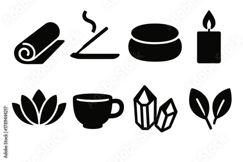 Mindful Icons Collection. Mindful Calm Collection silhouette icon set: yoga mat, incense stick, meditation cushion, candle, lotus flower, tea cup, crystals, leaves.