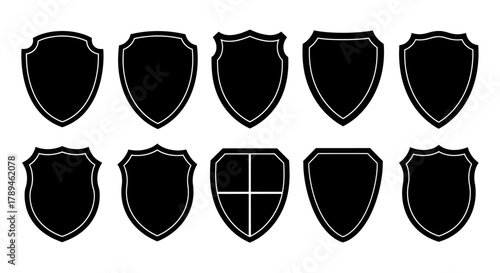 Collection of ten different black heraldic shield shapes on a white background
