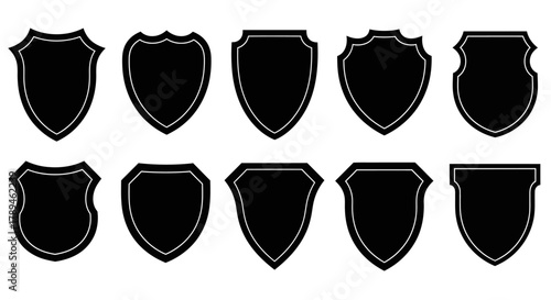 Collection of ten different black shield silhouettes on a white background for design elements