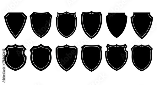 Collection of diverse shield shapes and styles in a black silhouette on a white background