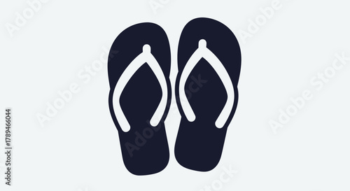 Two dark blue flip-flops are displayed on a light gray background.