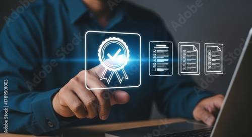 Businessman using laptop for document and certificate quality assurance