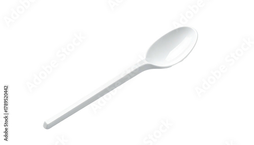 White spoon on a black background, diagonal view