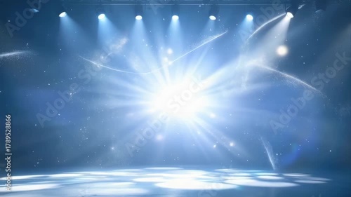 Dramatic Stage Lighting with Sparkling Particles and Lens Flares on Empty Concert Venue Floor During Performance Show