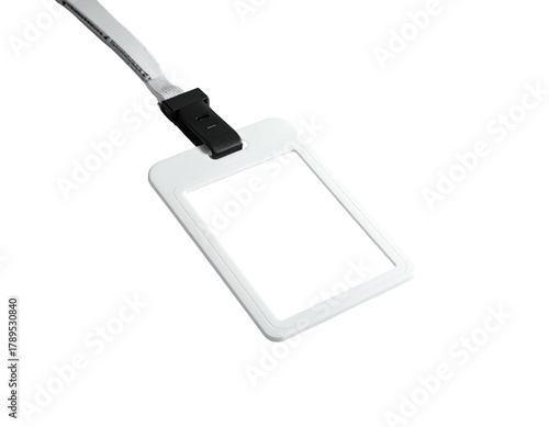 White name tag hanging against a black background, portrait orientation