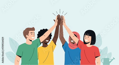 Diverse group of people giving a high five in unity and celebration.