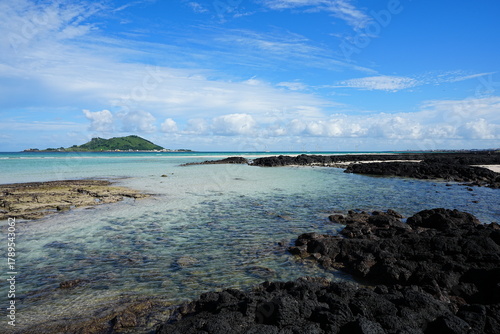 fascinating seascape with shoaling beach and far island