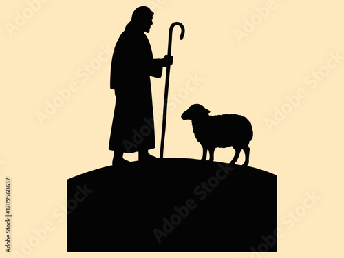 Silhouette of a shepherd and sheep on the hill.