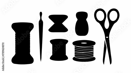 Sewing essentials for crafting perfection: Scissors, bobbins, and needle ready for your creative projects, perfect for fashion, design, and hobby concepts