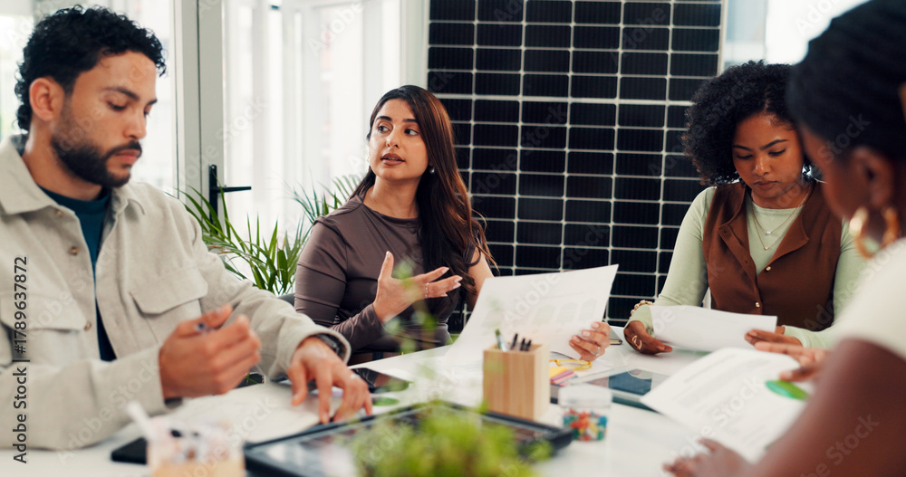 Fototapeta premium Woman, talk and documents with solar panel at office meeting, innovation and renewable energy at startup. Person, staff and team with sustainability, paperwork or photovoltaic electricity at agency