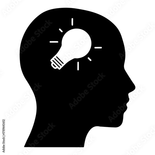 Silhouette of Head with Shining Light Bulb Inside Symbolizing Idea Innovation and Creative Thinking