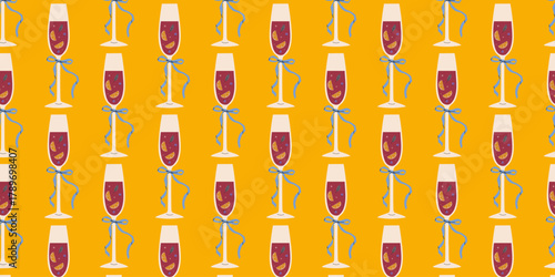 Elegant champagne glasses with bows in a vibrant pattern suitable for celebrations or events