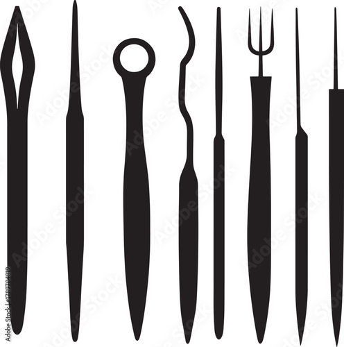 Silhouette of various sculpting and carving tools arranged in a row showing different shapes and sharp edges used for art craft pottery and woodwork
