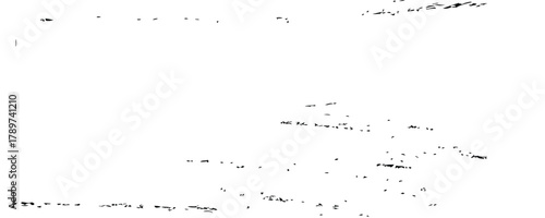 Abstract black ink splatters and drips on a stark white background creating a chaotic yet artistic texture