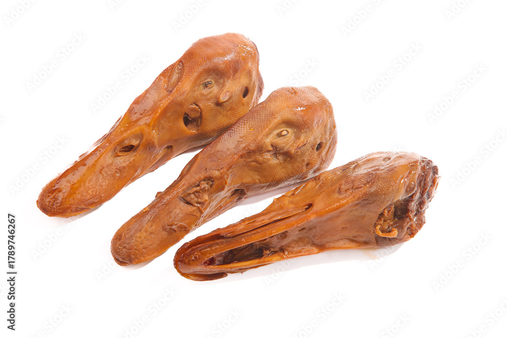 Obraz premium Marinated Duck Head with Spicy Red Oil - Traditional Asian Delicacy Food Ingredient
