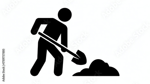 Silhouette of a person digging with a shovel