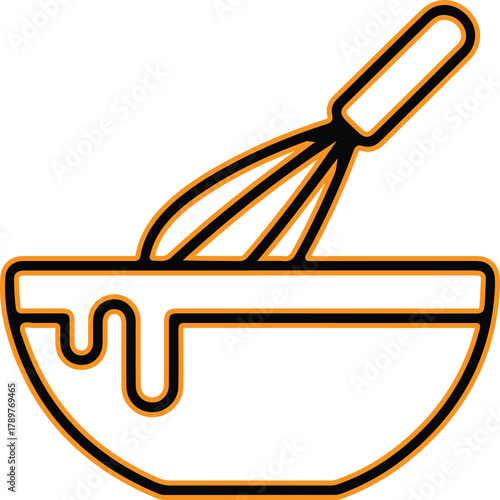 Whisk mixing ingredients in a bowl with batter