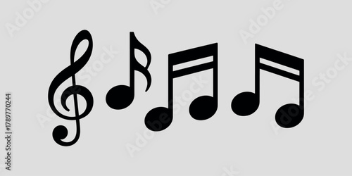 Simple black musical notes and treble clef on a gray background