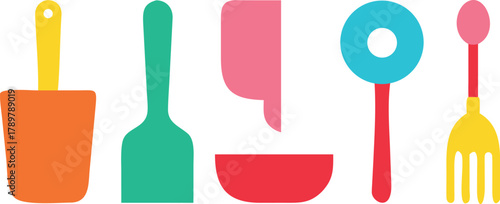 Colorful essential kitchen cooking utensils and food preparation equipment.