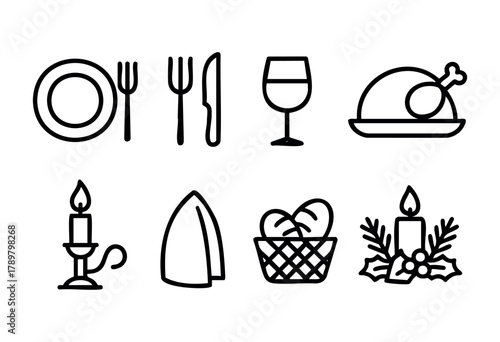 A beautifully arranged table display shows plates, utensils, glasses, and various decorative items suitable for a festive dinner. The setup includes candles and a delicious chicken dish.