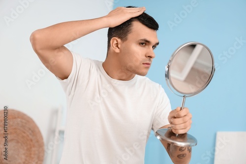 Young man with dandruff pro...