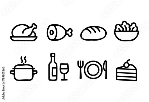 Delicious foods including chicken, bread, and salad are beautifully arranged alongside a wine bottle and dessert. The scene evokes a warm and inviting dining experience.