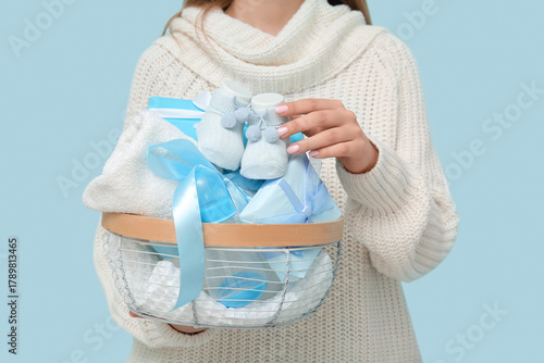 Woman with gift basket for ...