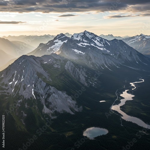 Mountain range with snow peaks and winding river
