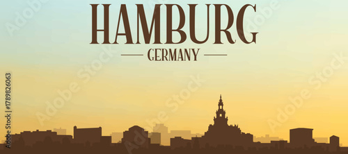 Panoramic poster of the city skyline with misty background buildings, hills sunrise, sunset and clouds of HAMBURG, GERMANY
