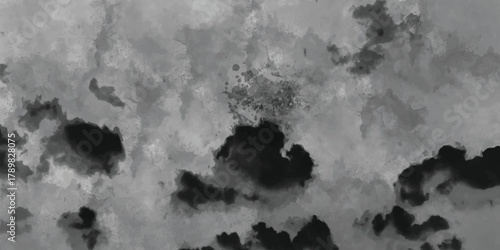 Abstract monochromatic watercolor texture with dark ink blotches isolated on white background