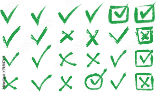 Hand-drawn green check mark and cross sign set