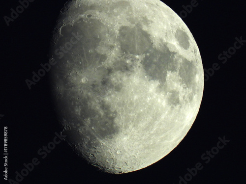 Vászonkép moon in waxing gibbous phase in the dark sky