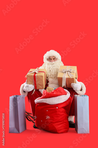 Santa Claus with gift boxes...