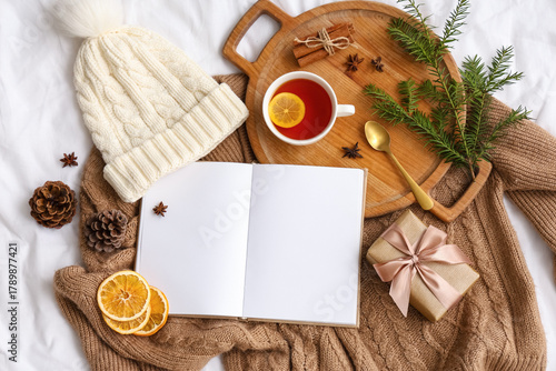 Blank book with lemon tea, ...