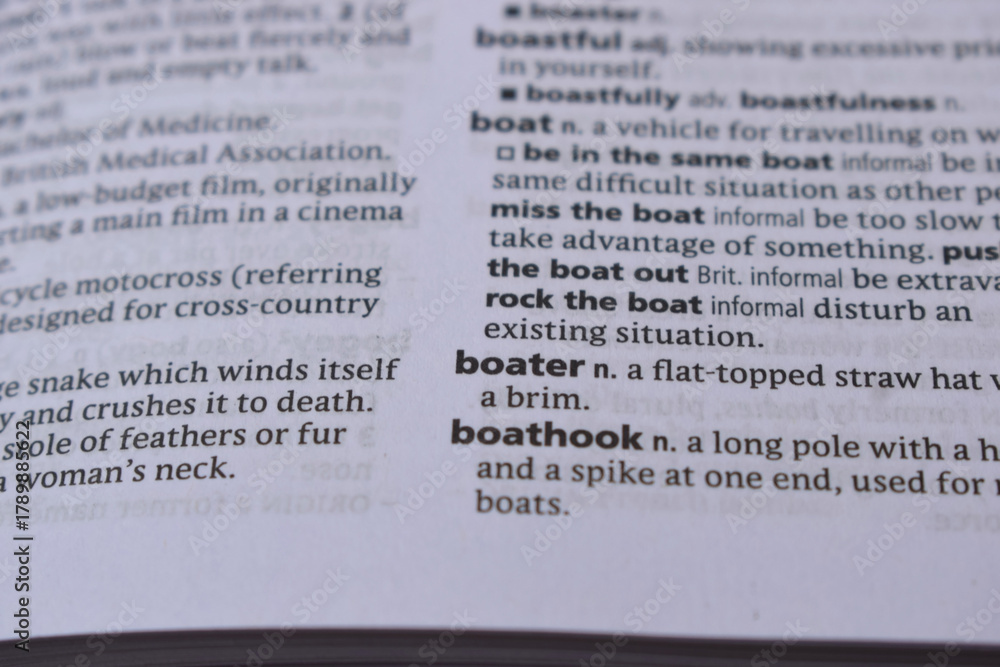 Fototapeta premium Close Up Of English Dictionary Page With Word - boater