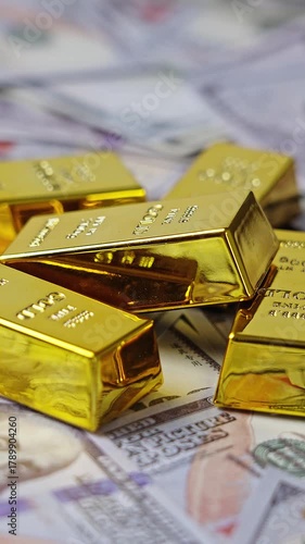100 dollar bills with gold bars. Wealth saving concept