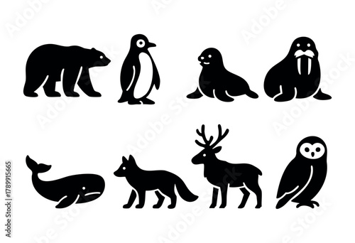 A set of eight minimalist black silhouettes of arctic and subarctic animals: polar bear, penguin, seal, walrus, whale, arctic fox, reindeer, and owl, isolated on white background. Perfect for logo, ic